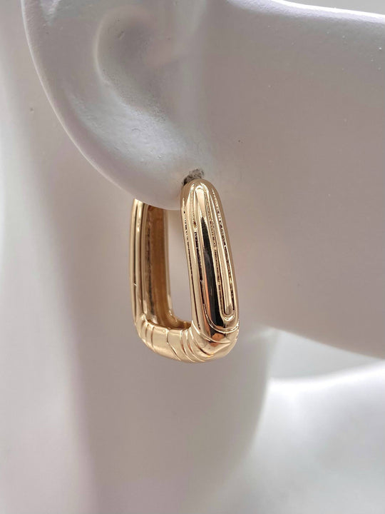 HUGGIE LIENAS CHAPA DE ORO 18K