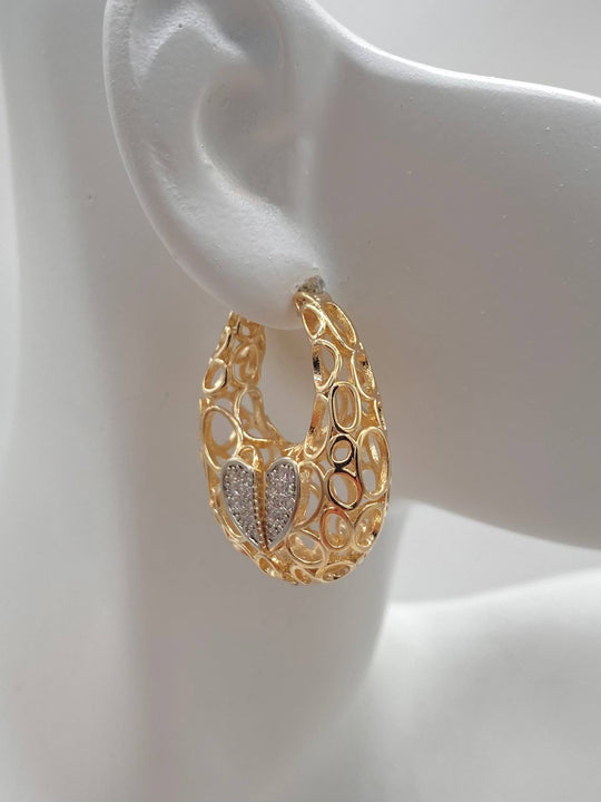 HUGGIE CANASTA CORAZON CHAPA DE ORO 18K