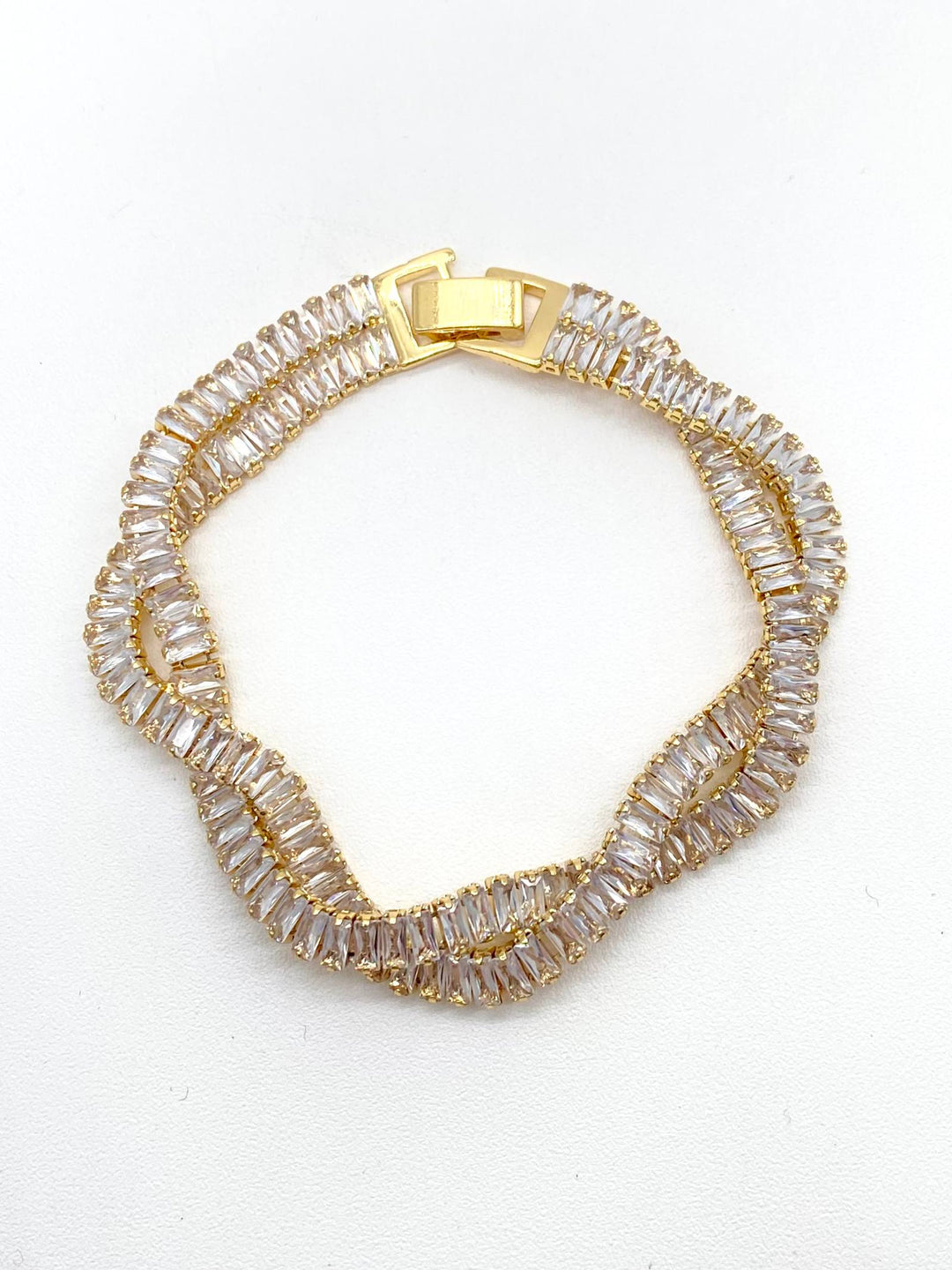PULSO TRENZADO ZIRCONIAS CHAPA DE ORO 18K