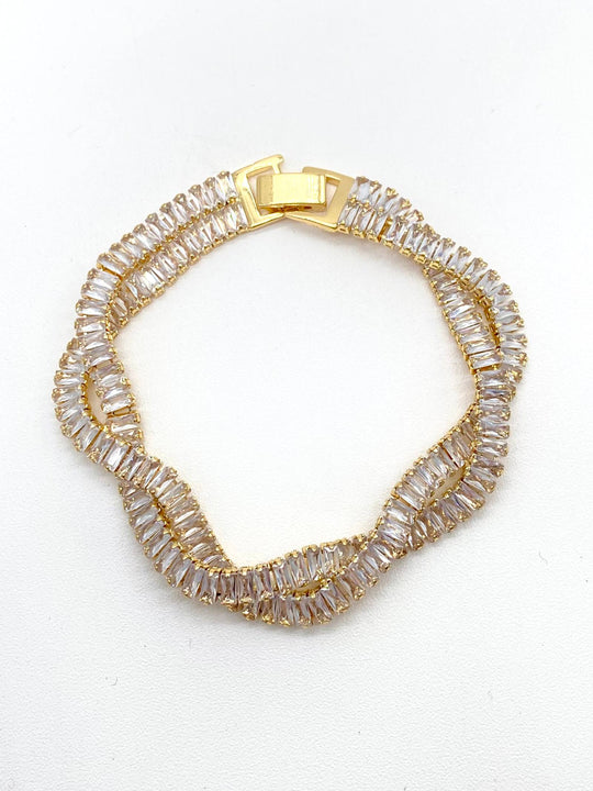 PULSO TRENZADO ZIRCONIAS CHAPA DE ORO 18K