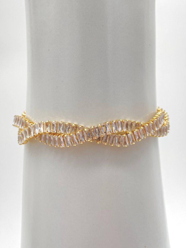 PULSO TRENZADO ZIRCONIAS CHAPA DE ORO 18K