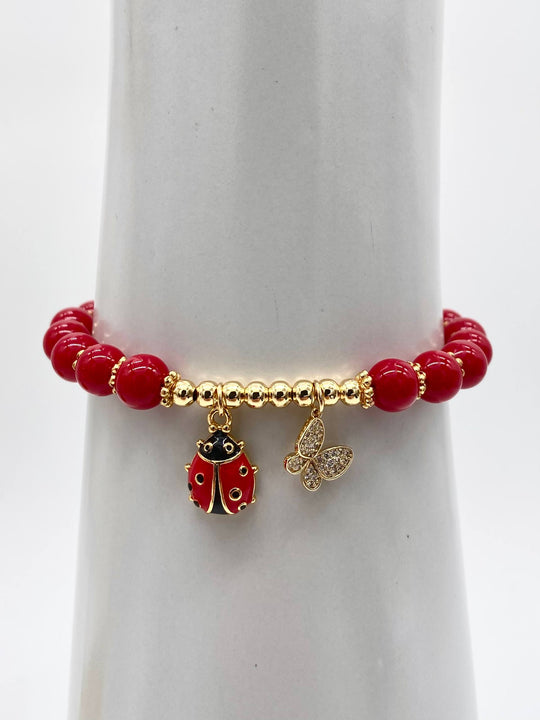 PULSO CATARINA Y MARIPOSA CHAPA DE ORO 18K