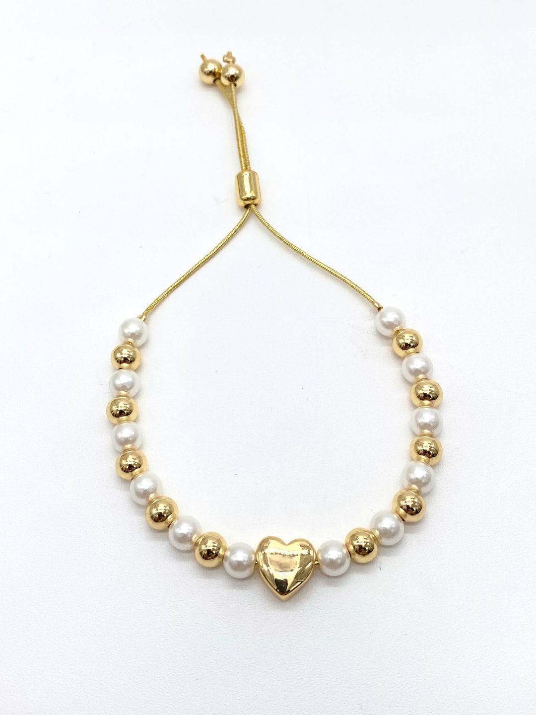 PULSO PERLAS CON CORAZON EN CHAPA DE ORO 18K