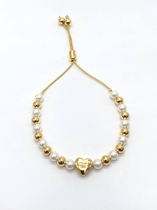 PULSO PERLAS CON CORAZON EN CHAPA DE ORO 18K