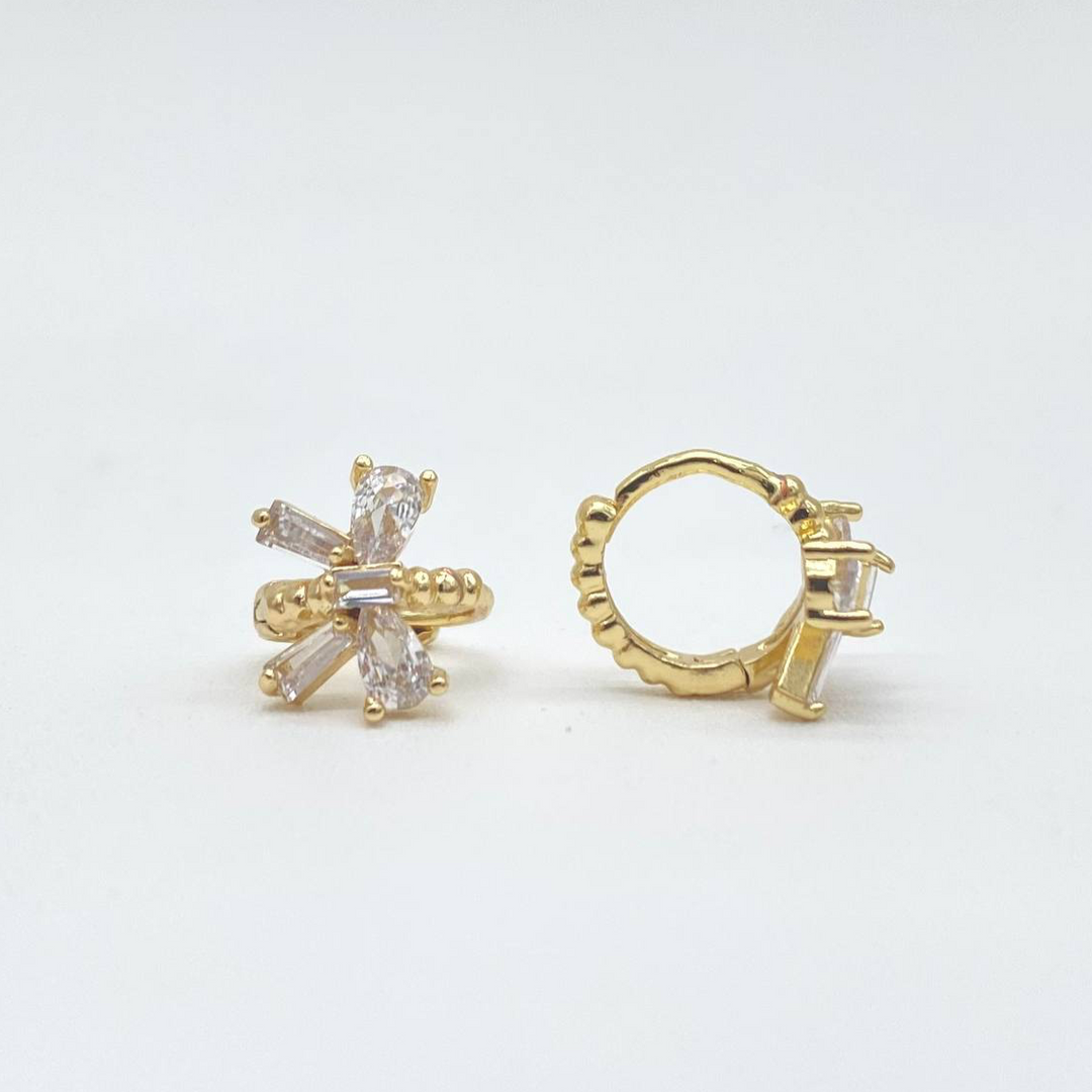 HUGGIE MO„O EN CHAPA DE ORO 18K