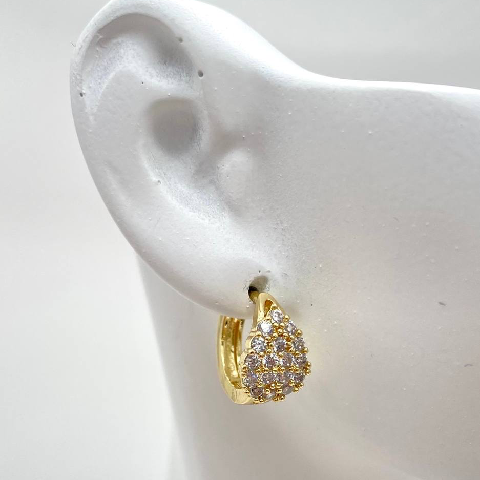 HUGGUIE CHAPA DE ORO 18K