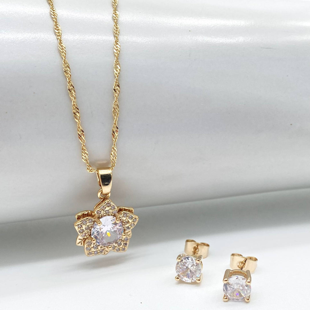 JUEGO FLOR CHAPA DE ORO 18K