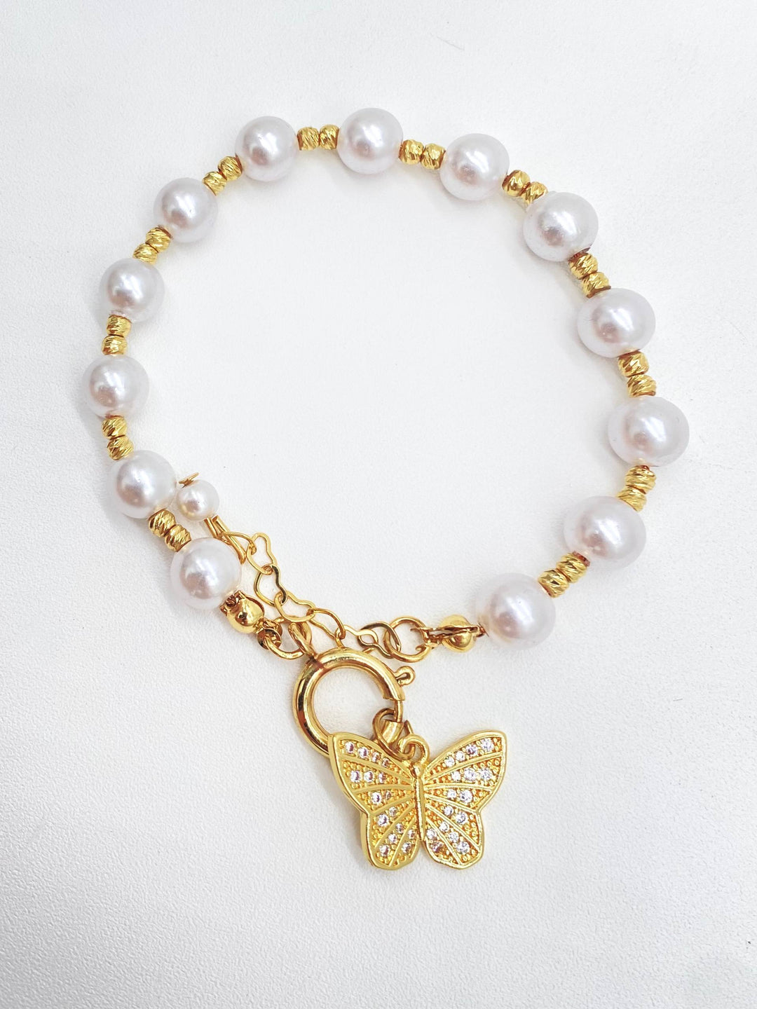 PULSO PERLAS CON MARIPOSA