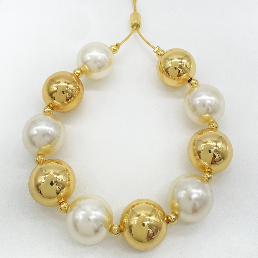 PULSERA CHAPA DE ORO 18K BOLAS