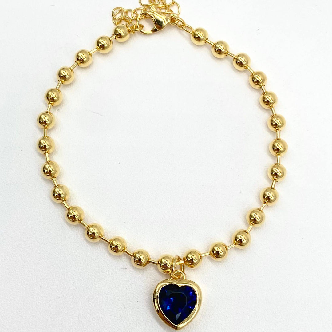 PULSO BOLAS CON CORAZON AZUL