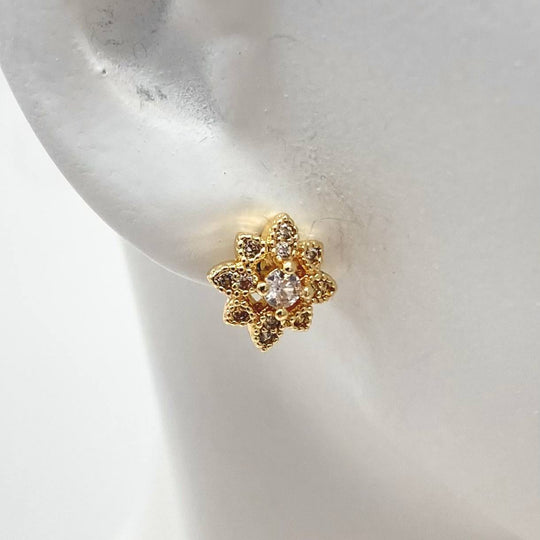 BROQUEL FLOR CHAPA DE ORO 18K