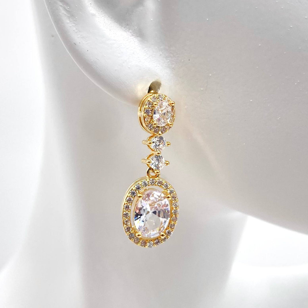 ARETE LARGO CHAPA DE ORO 18K