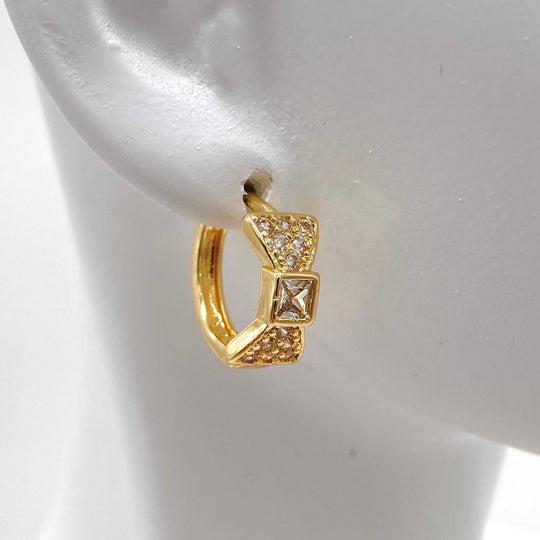HUGGIE CHAPA DE ORO 18K