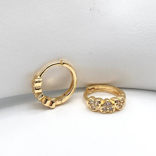 HUGGIE 3 CORAZONES CHAPA DE ORO 18K