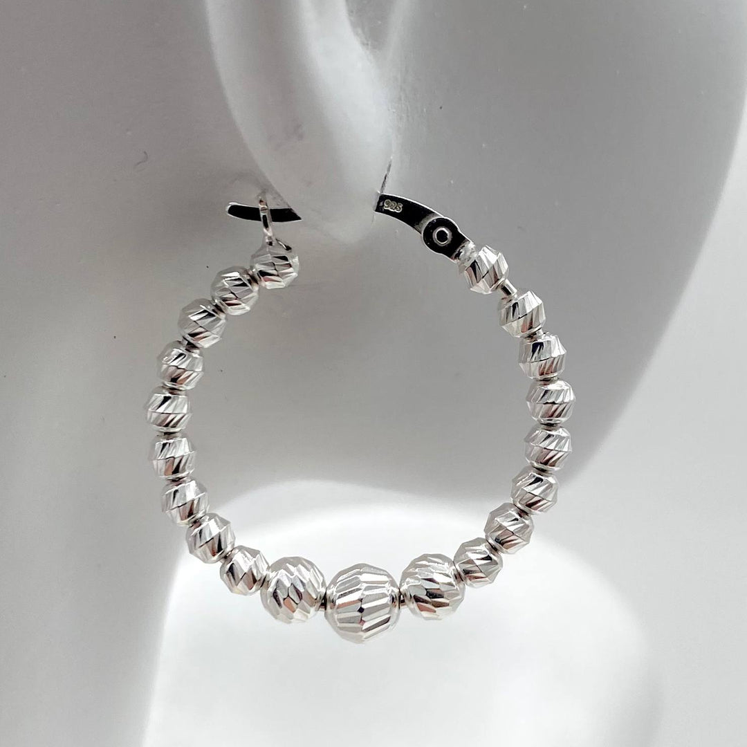 ARRACADA BOLAS FACETADAS PLATA 925