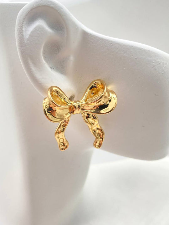 ARETE MOÑO CHAPA DE ORO 18K