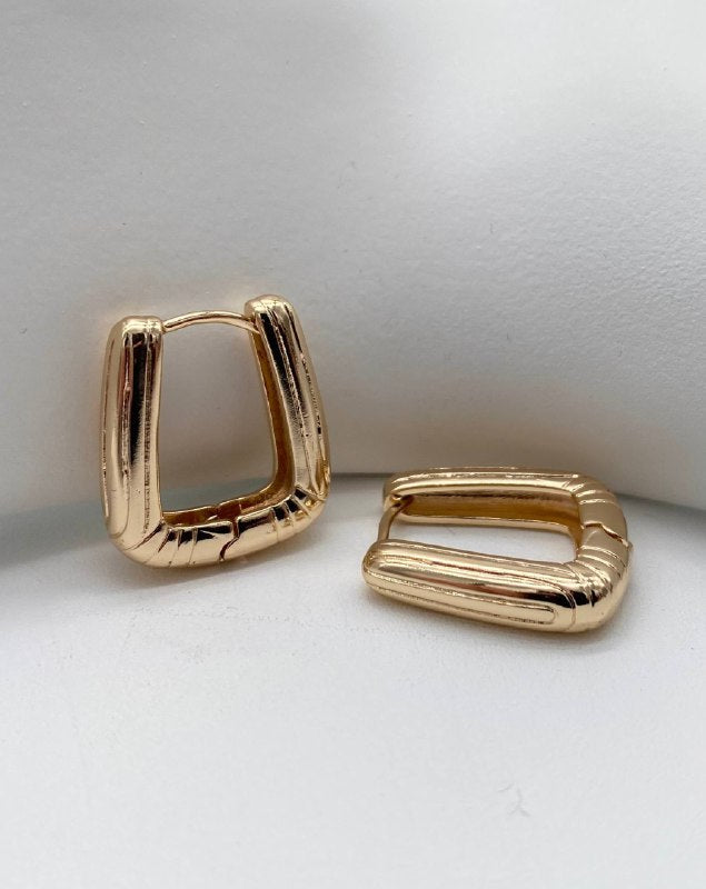 HUGGIE LIENAS CHAPA DE ORO 18K