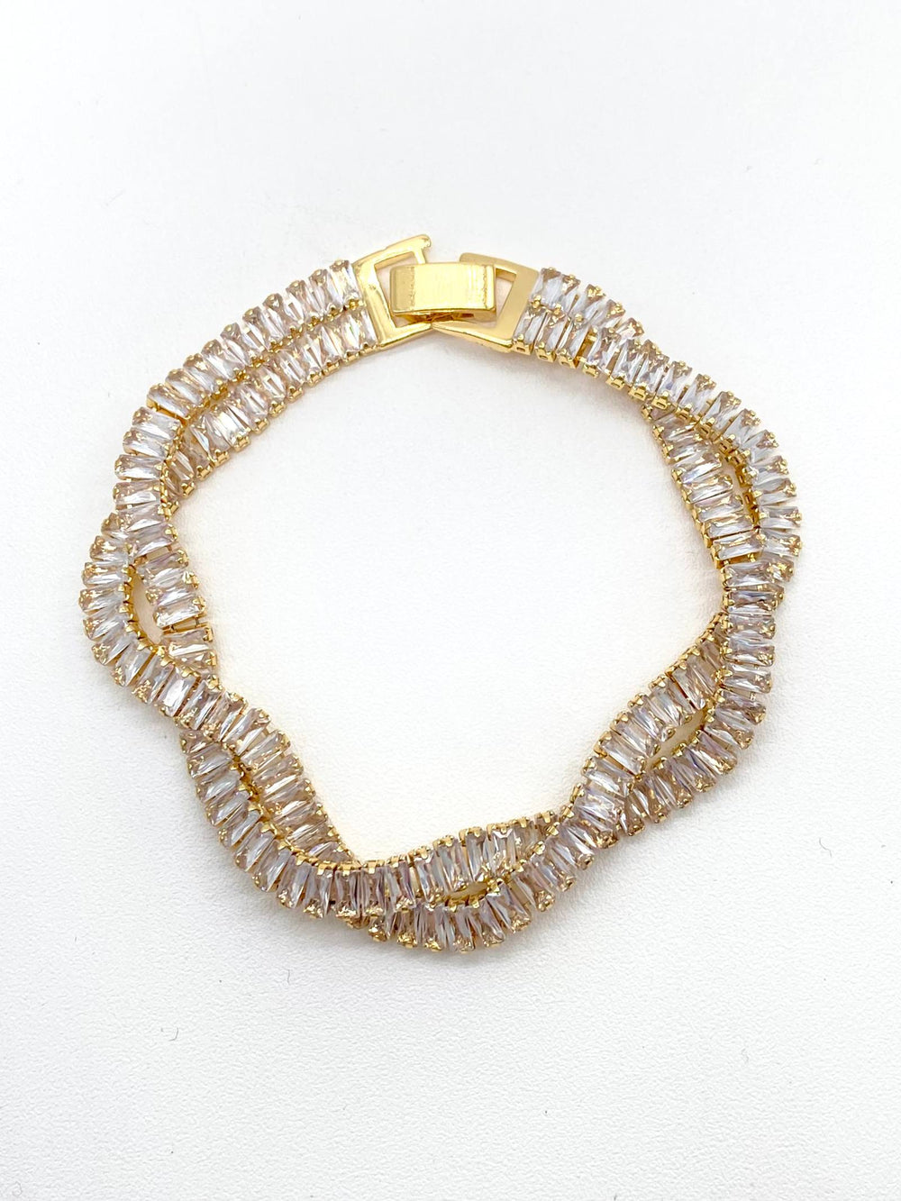 PULSO TRENZADO ZIRCONIAS CHAPA DE ORO 18K