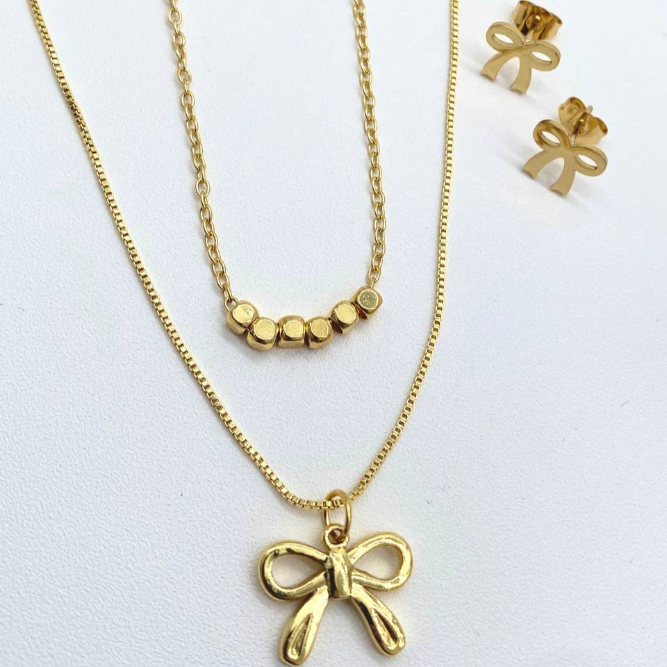 JUEGO MOÑO CHAPA DE ORO 18K