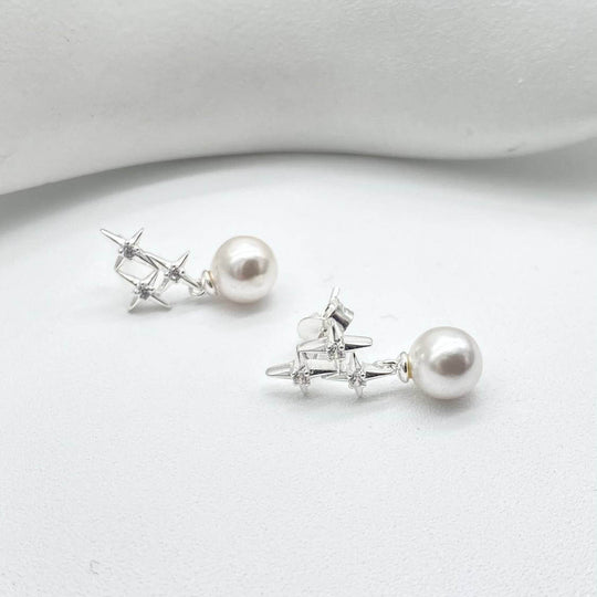 ARETE ESTRELLA CON PERLA PLATA 925
