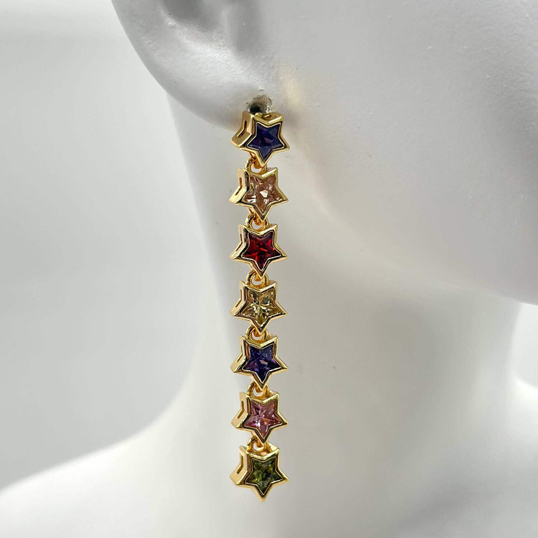 Arete estrellas largo– Chapa de oro 18K | MAEL