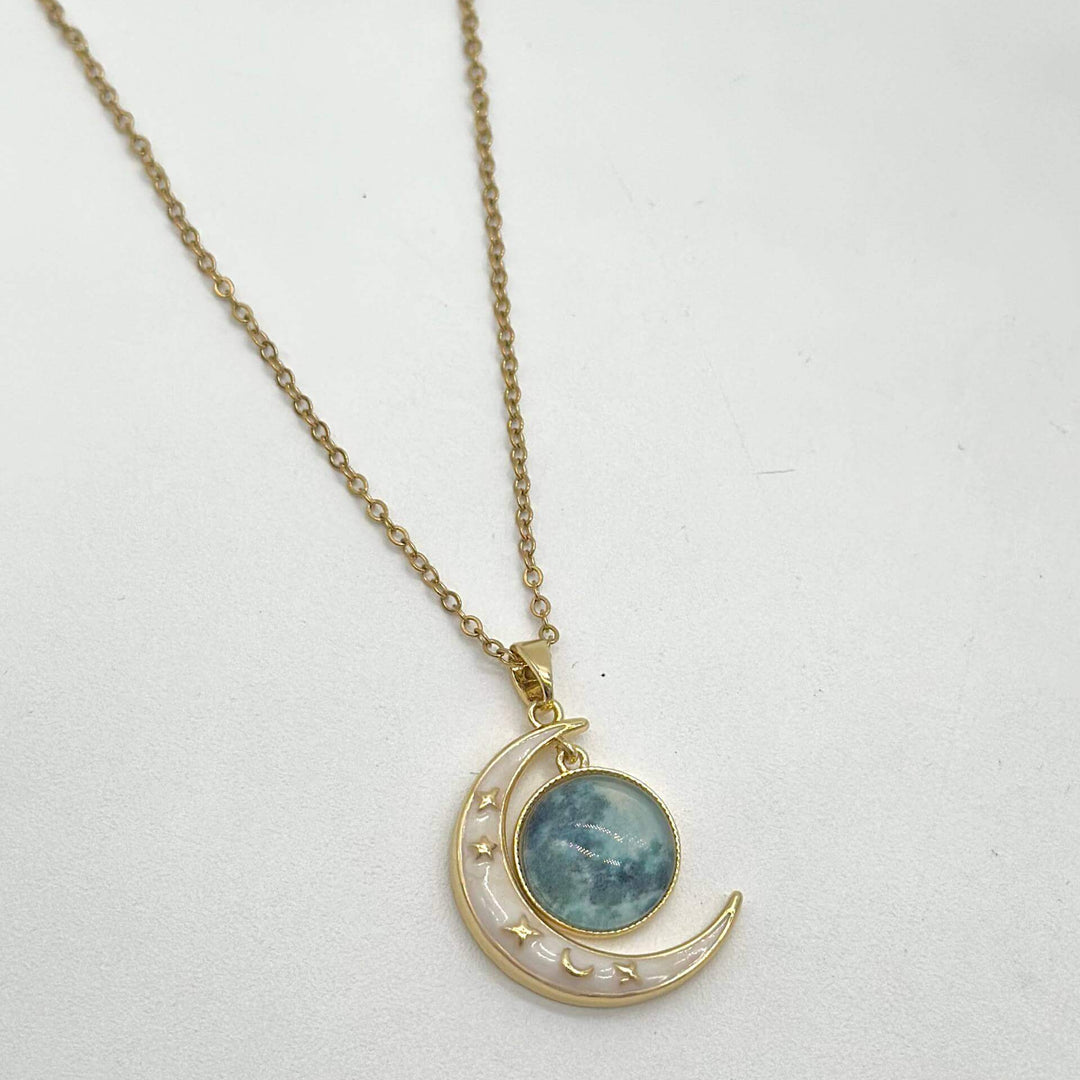 Cadena Luna y mundo – Chapa de Oro 18K | MAEL