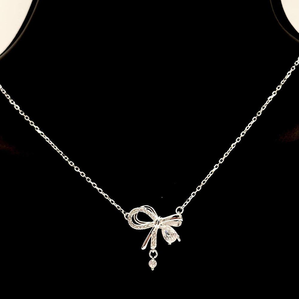 CADENA CON DIJE MOÑO PLATA 925