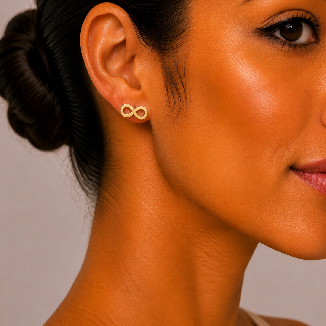 Broqueles Infinito de Acero Inoxidable Dorado | Mael Joyería