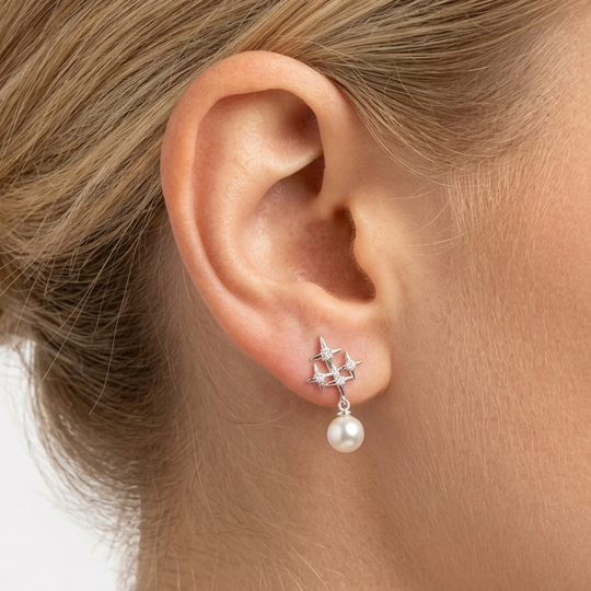 ARETE ESTRELLA CON PERLA PLATA 925