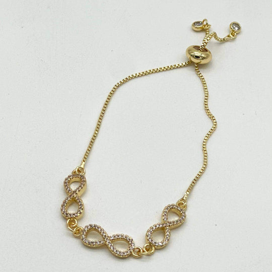 Pulsera Tres infinitos – Chapa de Oro 18K | MAEL