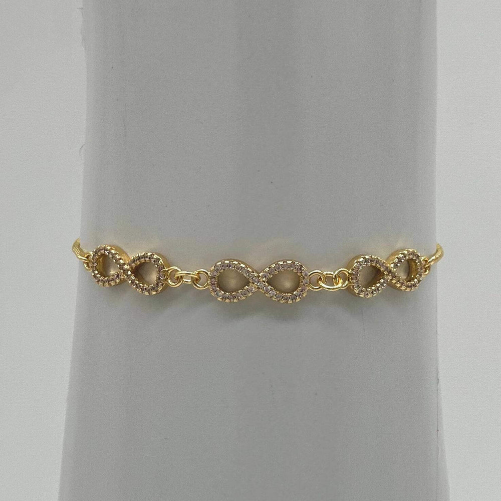Pulsera Tres infinitos – Chapa de Oro 18K | MAEL