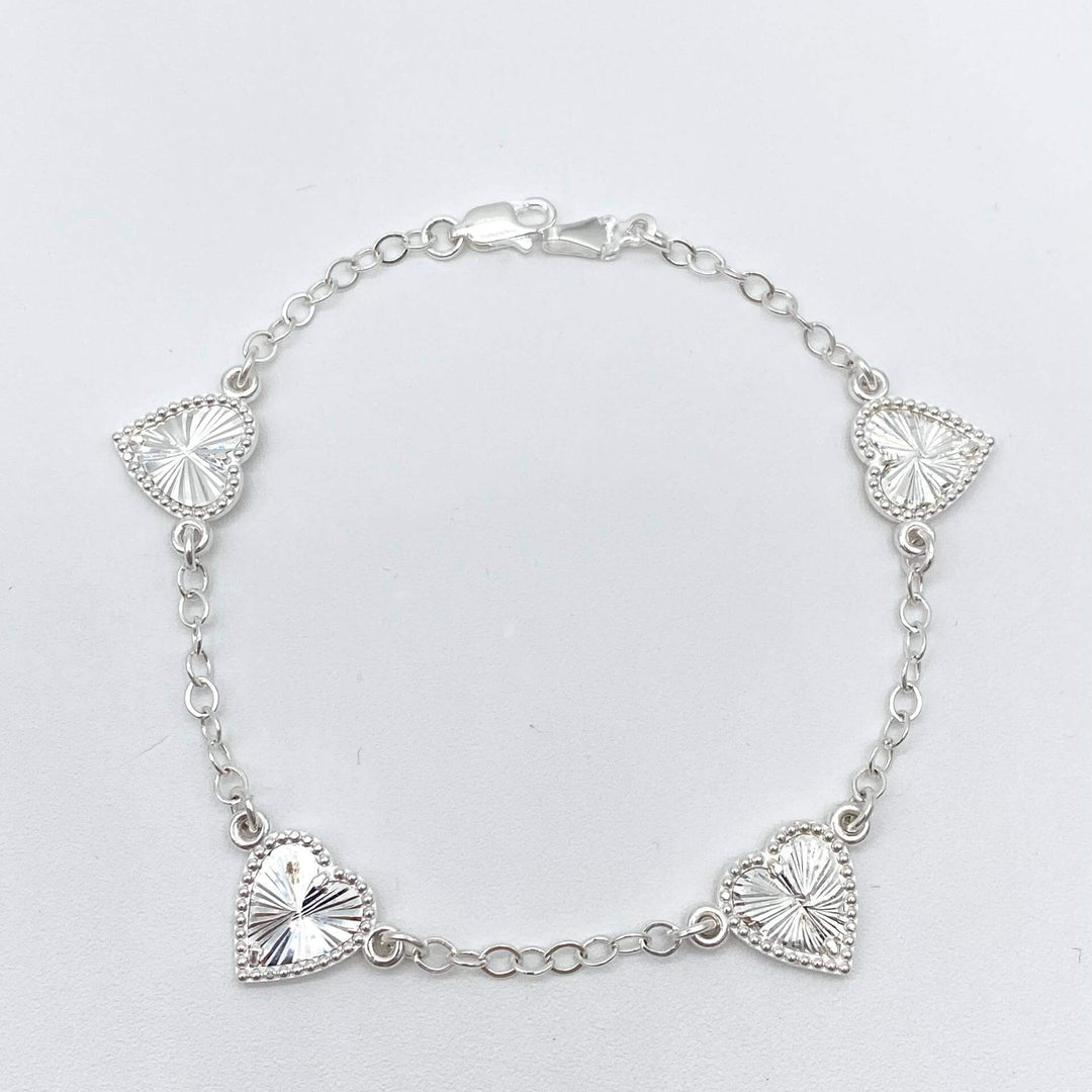 PULSO CORAZONES PLATA 925