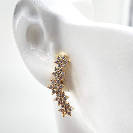 Arete estrellas – Chapa de Oro 18K | MAEL