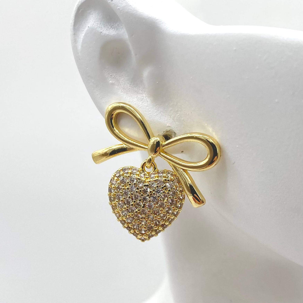 Arete corazon con mono – Chapa de oro 18K | MAEL