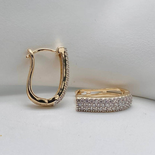 Huggie zirconias – Chapa de Oro 18K | MAEL
