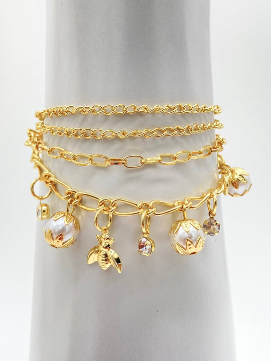 PULSERA COLGANTES CHAPA DE ORO 18K