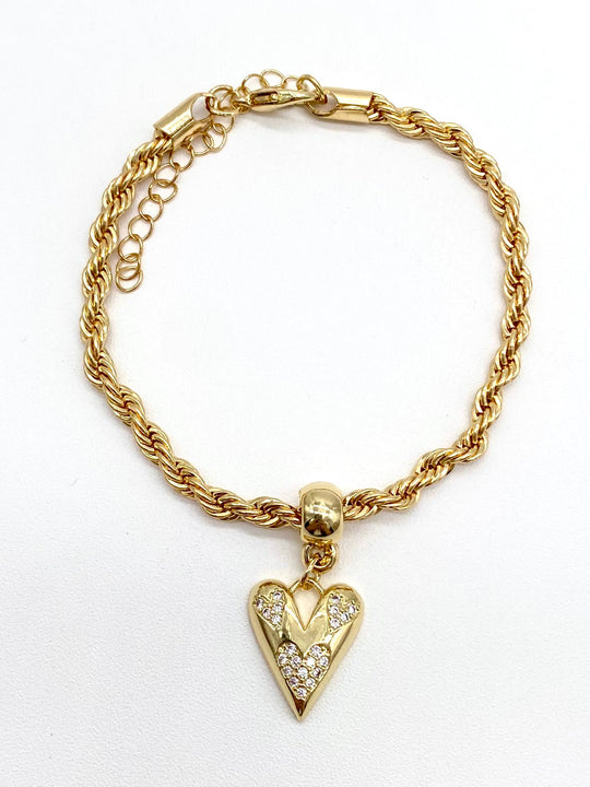 PULSO TORSAL CON DIJE DE CORAZON