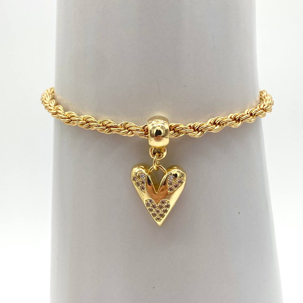 PULSO TORSAL CON DIJE DE CORAZON