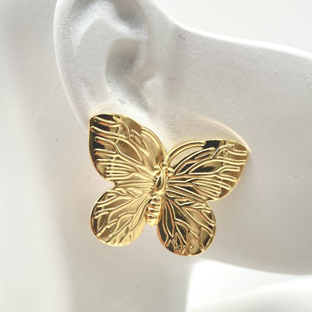 ARETE EN FORMA DE MARIPOSA