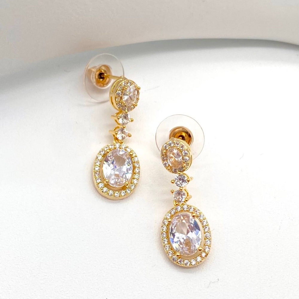 ARETE LARGO CHAPA DE ORO 18K