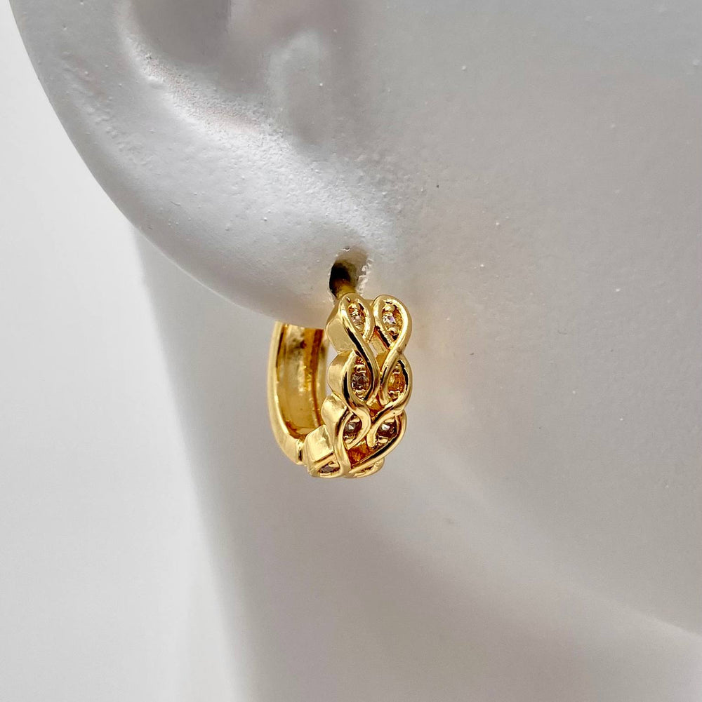 HUGGIE ENTRELAZADO CHAPA DE ORO 18K
