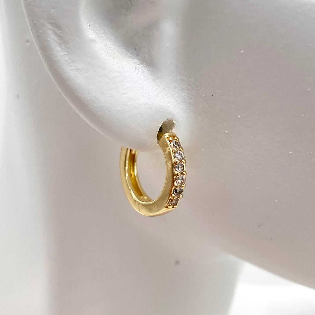 HUGGIE CHAPA DE ORO 18K