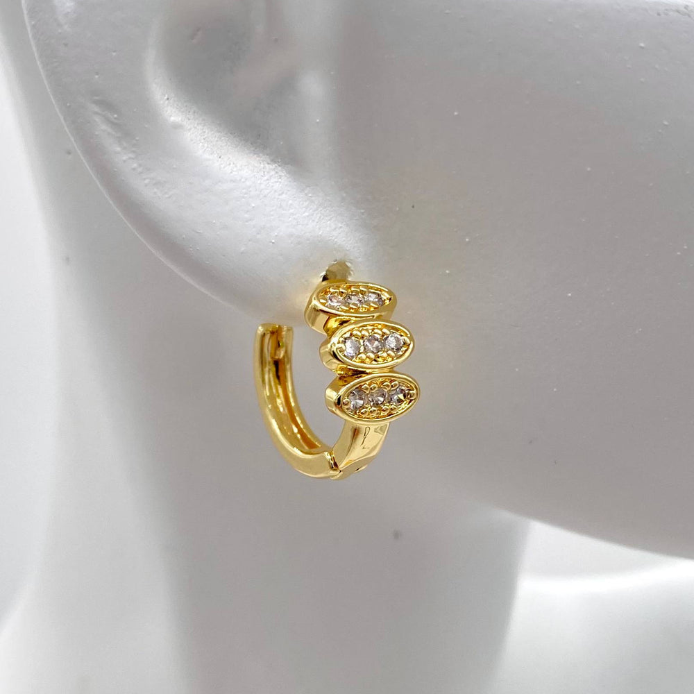 HUGGIE CHAPA DE ORO 18K