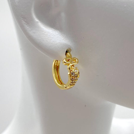 HUGGIE CHAPA DE ORO 18K