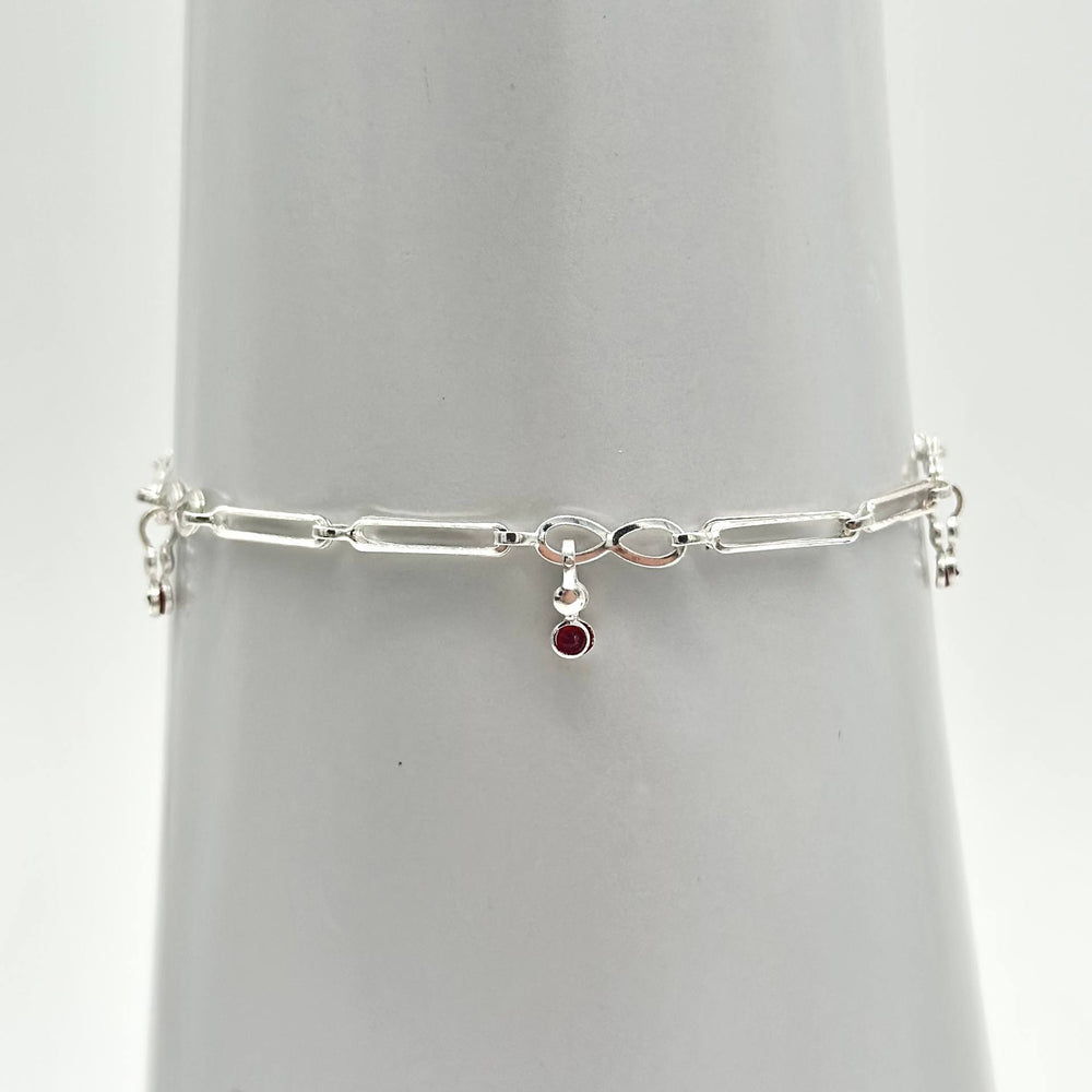 Pulsera con Zirconias Rojas Colgantes – Plata 925 | Mael Joyería