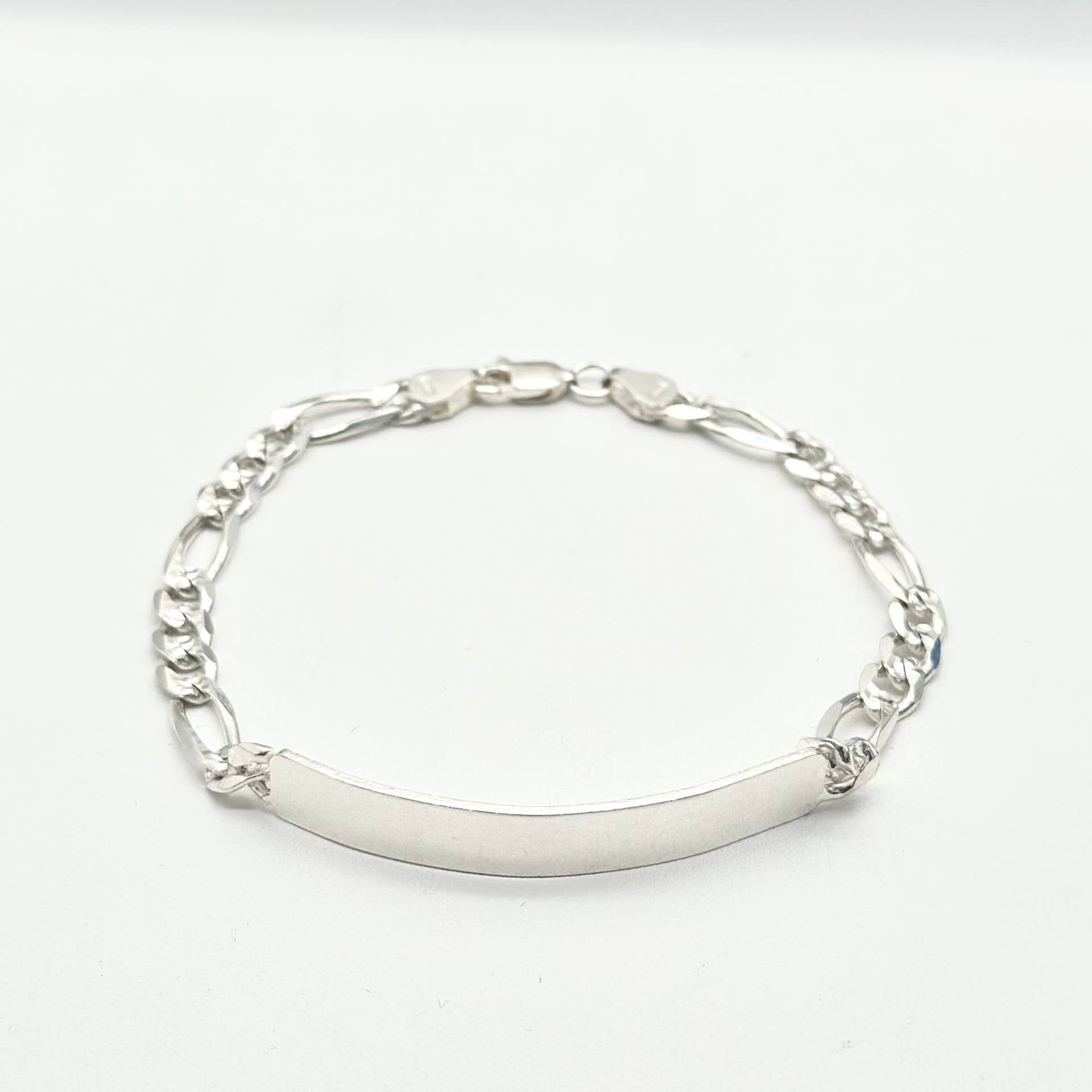 Esclava de plata 925 con tejido Cartier y placa lisa para grabado, medida de 18 cm de largo por 5 mm de ancho.