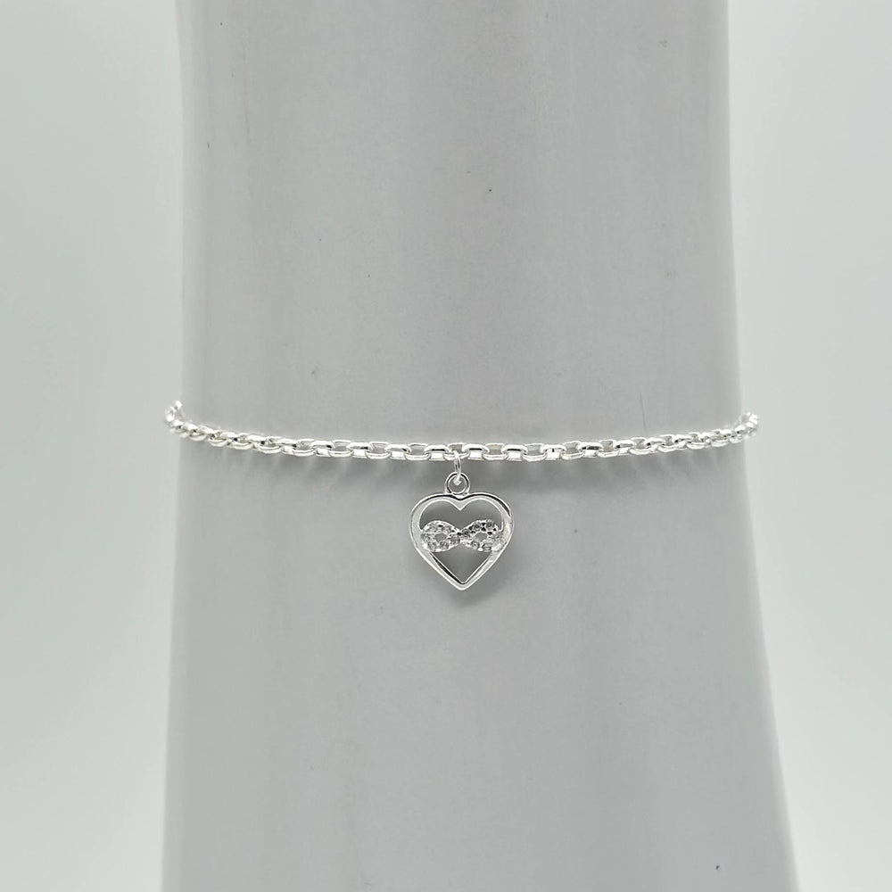 Pulsera de plata 925 mexicana con corazón, símbolo infinito y zirconias brillantes, medida de 16 cm con extensión ajustable de 5 cm.