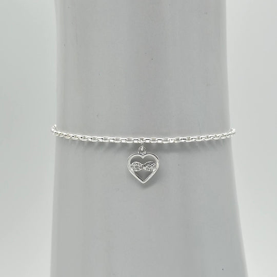 Pulsera de plata 925 mexicana con corazón, símbolo infinito y zirconias brillantes, medida de 16 cm con extensión ajustable de 5 cm.