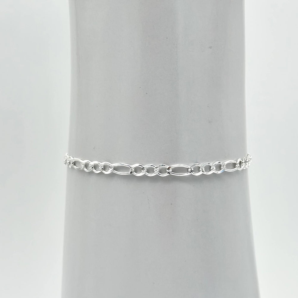 Pulsera tejido Cartier elaborada en plata 925 mexicana con acabado brillante, 21 cm de largo y 5 mm de ancho.