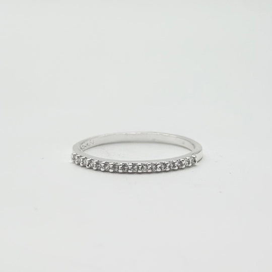 Anillo churumbela de plata 925 con fila de zirconias brillantes y acabado pulido.